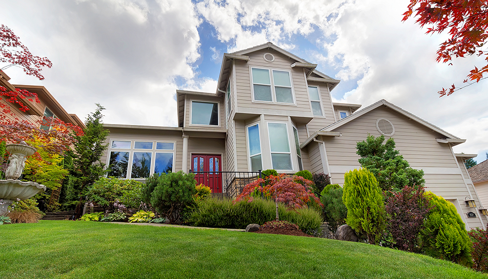 Exterior of a single family house seen while preforming home inspection services