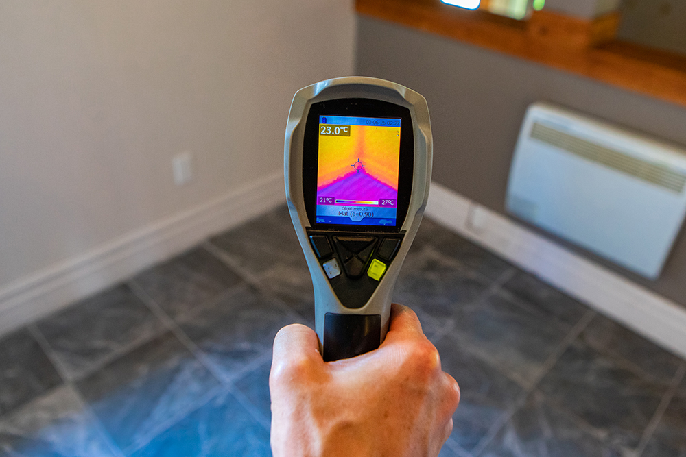 infrared thermal vision camera being used while preforming home inspection services